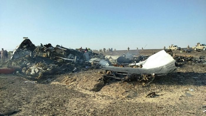 epa05005254 Debris from crashed Russian jet lies strewn across the sand at the site of the crash in Sinai, Egypt, 31 October 2015. According to reports the Egyptian Government has dispatched more than 45 ambulances to the crash site of the Kogalymavia Metrojet Russian passenger jet, which disappeared from raider after requesting an emergency landing early 31 October, crashing in the mountainous al-Hasanah area of central Sinai. The black box has been recovered at the site. EPA/STR BEST QUALITY AVAILABLE